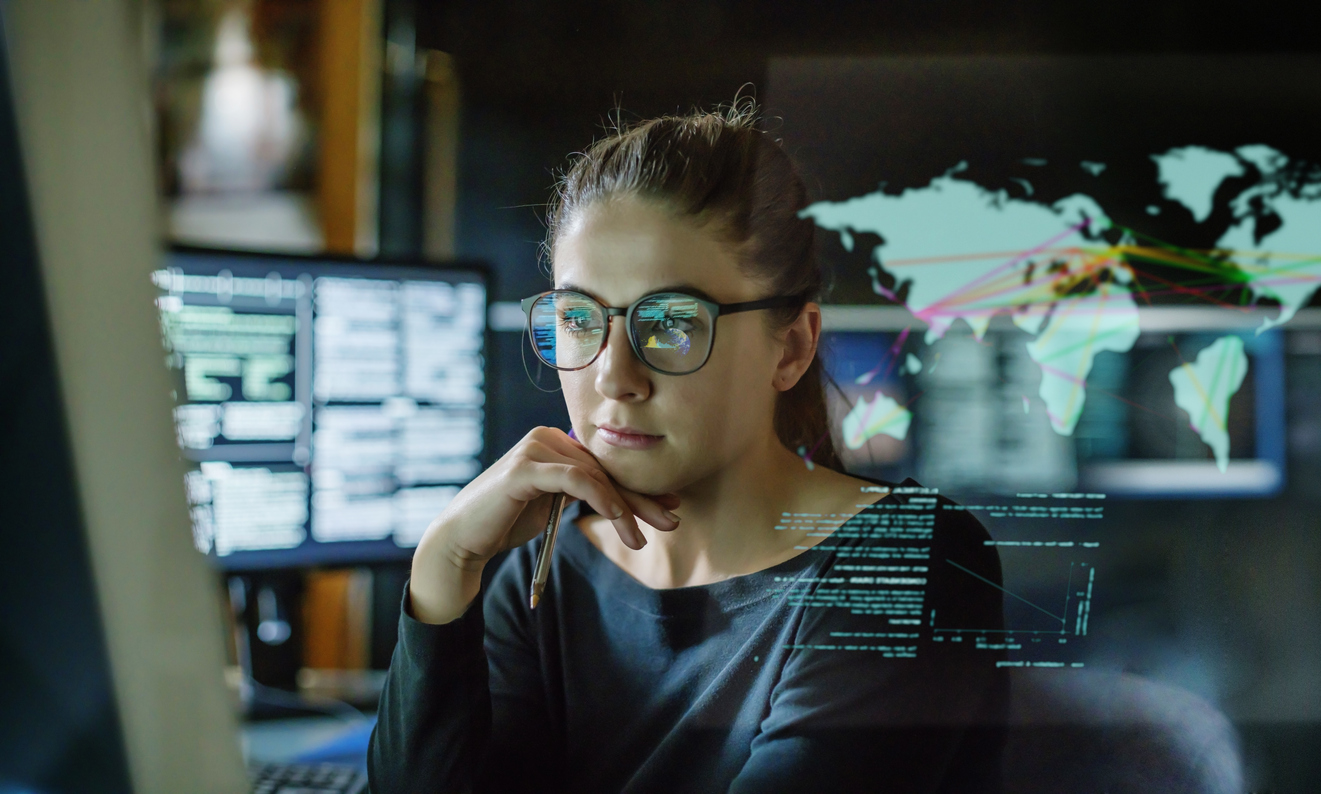 Woman looking at map visualizations